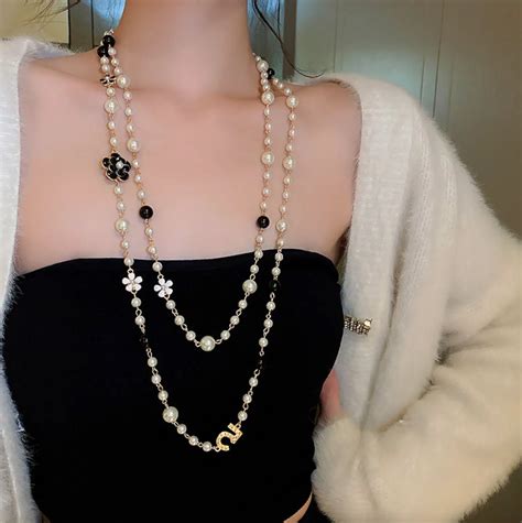 chanel barbie necklace dupe|chanel chain dupe.